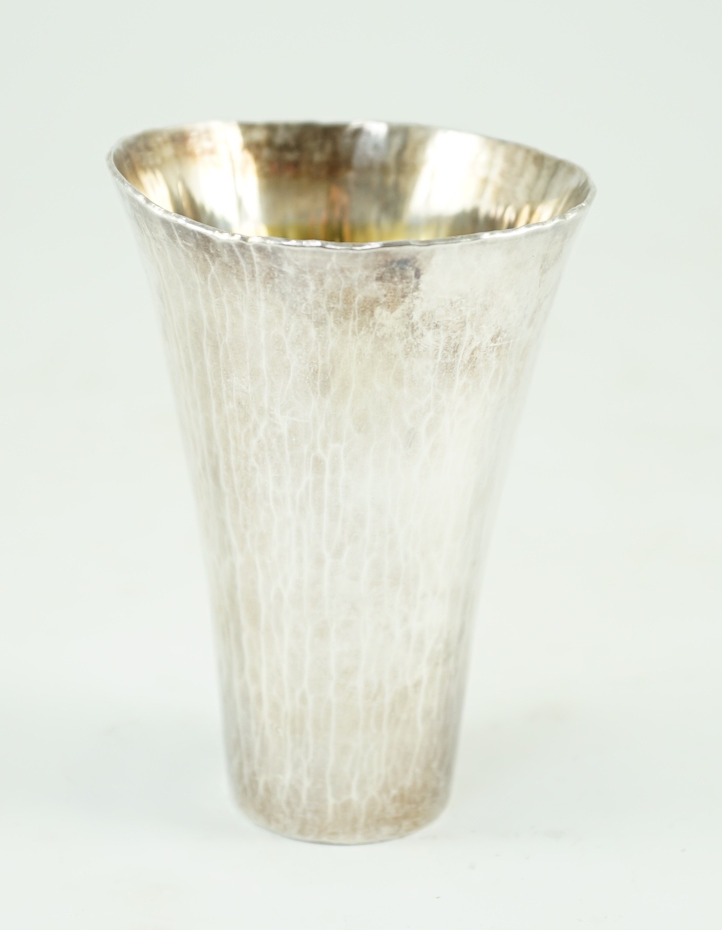 A modern Britannia standard planished silver cup, by Malcolm Appleby